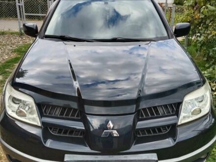 Мицубиси Аутлендер 2005 в Калуше на Automoto.ua Черный Мицубиси Аутлендер, объемом двигателя 2.4 л и пробегом 213 тыс. км за 6300 $, фото 1 на Automoto.ua