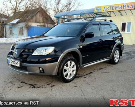 Чорний Міцубісі Аутлендер, об'ємом двигуна 2.4 л та пробігом 1500 тис. км за 5950 $, фото 1 на Automoto.ua