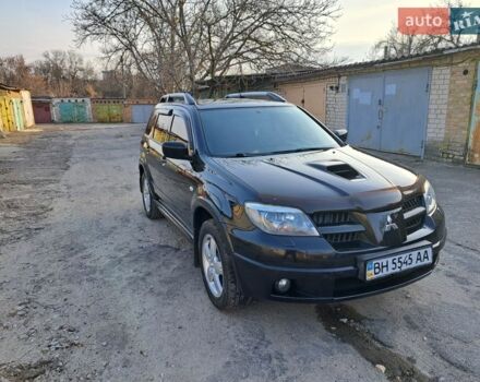 Чорний Міцубісі Аутлендер, об'ємом двигуна 2 л та пробігом 172 тис. км за 6800 $, фото 1 на Automoto.ua