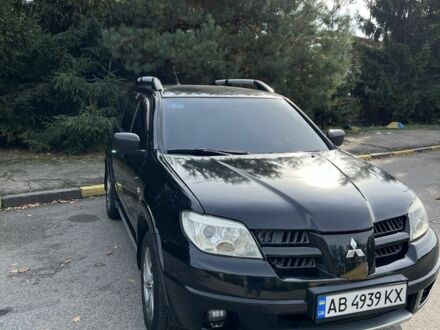Мицубиси Аутлендер 2006 в Белой Церкве на Automoto.ua Черный Мицубиси Аутлендер, объемом двигателя 2.4 л и пробегом 333 тыс. км за 5999 $, фото 1 на Automoto.ua