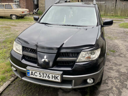Міцубісі Аутлендер 2006 у Шацькі на Automoto.ua Чорний Міцубісі Аутлендер, об'ємом двигуна 2 л та пробігом 261 тис. км за 5900 $, фото 1 на Automoto.ua
