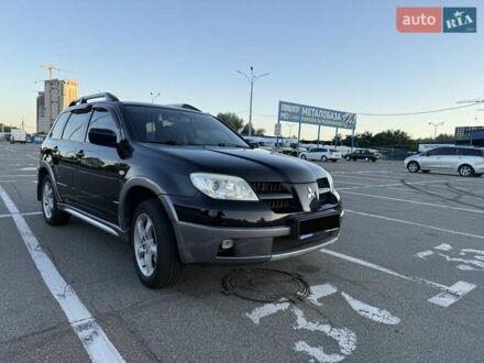 Мицубиси Аутлендер 2006 в Киеве на Automoto.ua Черный Мицубиси Аутлендер, объемом двигателя 2 л и пробегом 158 тыс. км за 6900 $, фото 1 на Automoto.ua