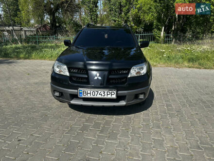 Мицубиси Аутлендер 2006 в Одессе на Automoto.ua Черный Мицубиси Аутлендер, объемом двигателя 2.38 л и пробегом 306 тыс. км за 6700 $, фото 1 на Automoto.ua