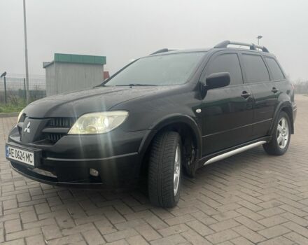 Чорний Міцубісі Аутлендер, об'ємом двигуна 2.4 л та пробігом 277 тис. км за 6700 $, фото 1 на Automoto.ua