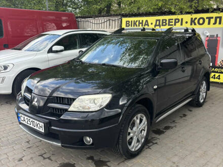 Мицубиси Аутлендер 2006 в Черкассах на Automoto.ua Черный Мицубиси Аутлендер, объемом двигателя 2.38 л и пробегом 253 тыс. км за 7800 $, фото 1 на Automoto.ua