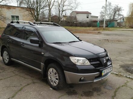 Міцубісі Аутлендер 2006 у Дніпро (Дніпропетровську) на Automoto.ua Чорний Міцубісі Аутлендер, об'ємом двигуна 2 л та пробігом 171 тис. км за 7000 $, фото 1 на Automoto.ua