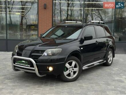 Мицубиси Аутлендер 2006 в Киеве на Automoto.ua Черный Мицубиси Аутлендер, объемом двигателя 2.4 л и пробегом 226 тыс. км за 7190 $, фото 1 на Automoto.ua
