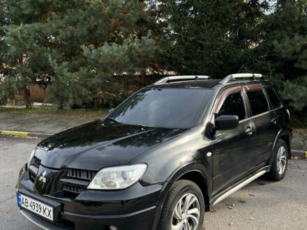 Міцубісі Аутлендер 2006 у Белой Церкве на Automoto.ua Чорний Міцубісі Аутлендер, об'ємом двигуна 2.38 л та пробігом 333 тис. км за 5999 $, фото 1 на Automoto.ua