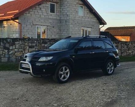 Міцубісі Аутлендер 2006 у Івано-Франківську на Automoto.ua Чорний Міцубісі Аутлендер, об'ємом двигуна 2 л та пробігом 263 тис. км за 7250 $, фото 1 на Automoto.ua