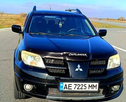 Чорний Міцубісі Аутлендер, об'ємом двигуна 2.4 л та пробігом 265 тис. км за 7500 $, фото 1 на Automoto.ua