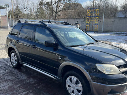 Міцубісі Аутлендер 2006 у Вінниці на Automoto.ua Чорний Міцубісі Аутлендер, об'ємом двигуна 2 л та пробігом 321 тис. км за 5500 $, фото 1 на Automoto.ua