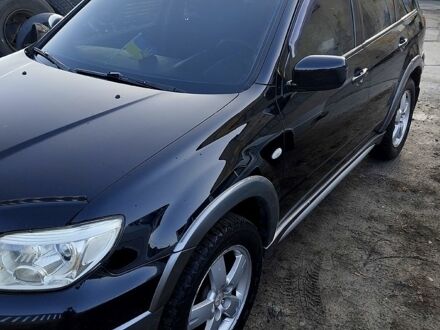 Міцубісі Аутлендер 2006 у Дніпро (Дніпропетровську) на Automoto.ua Чорний Міцубісі Аутлендер, об'ємом двигуна 2 л та пробігом 264 тис. км за 6550 $, фото 1 на Automoto.ua