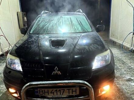 Мицубиси Аутлендер 2006 в Подольск (Котовск) на Automoto.ua Черный Мицубиси Аутлендер, объемом двигателя 2 л и пробегом 170 тыс. км за 9000 $, фото 1 на Automoto.ua