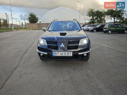 Чорний Міцубісі Аутлендер, об'ємом двигуна 2 л та пробігом 207 тис. км за 6900 $, фото 1 на Automoto.ua
