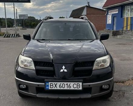 Чорний Міцубісі Аутлендер, об'ємом двигуна 2.38 л та пробігом 275 тис. км за 6500 $, фото 1 на Automoto.ua