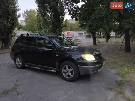 Мицубиси Аутлендер 2006 в Кременчуге на Automoto.ua Черный Мицубиси Аутлендер, объемом двигателя 2 л и пробегом 370 тыс. км за 7000 $, фото 1 на Automoto.ua