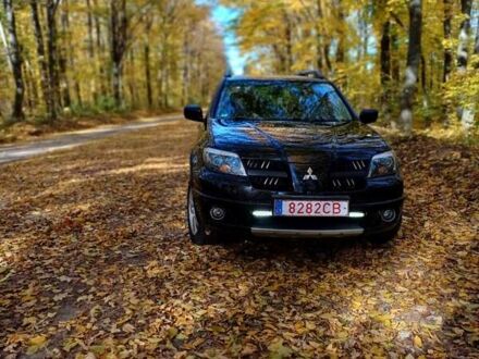Мицубиси Аутлендер 2006 в Гайсине на Automoto.ua Черный Мицубиси Аутлендер, объемом двигателя 2.4 л и пробегом 164 тыс. км за 5100 $, фото 1 на Automoto.ua