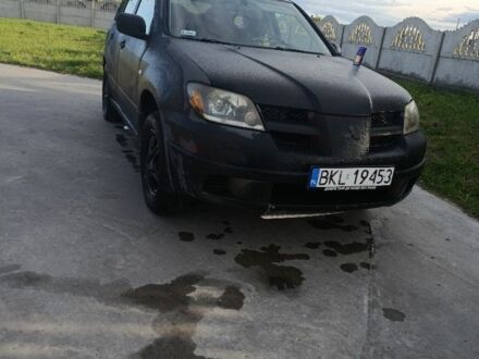 Міцубісі Аутлендер 2006 у Дубровице на Automoto.ua Чорний Міцубісі Аутлендер, об'ємом двигуна 2 л та пробігом 307 тис. км за 3000 $, фото 1 на Automoto.ua
