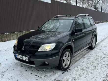 Чорний Міцубісі Аутлендер, об'ємом двигуна 2.4 л та пробігом 308 тис. км за 4700 $, фото 1 на Automoto.ua