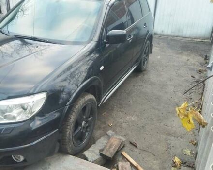 Чорний Міцубісі Аутлендер, об'ємом двигуна 2.4 л та пробігом 280 тис. км за 5455 $, фото 1 на Automoto.ua