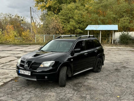 Мицубиси Аутлендер 2006 в Богодухове на Automoto.ua Черный Мицубиси Аутлендер, объемом двигателя 2 л и пробегом 190 тыс. км за 5700 $, фото 1 на Automoto.ua