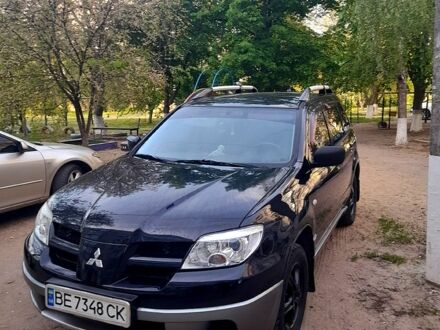 Мицубиси Аутлендер 2006 в Вознесенске на Automoto.ua Черный Мицубиси Аутлендер, объемом двигателя 2 л и пробегом 226 тыс. км за 7000 $, фото 1 на Automoto.ua