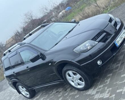 Чорний Міцубісі Аутлендер, об'ємом двигуна 2.4 л та пробігом 202 тис. км за 5800 $, фото 1 на Automoto.ua