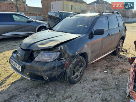 Чорний Міцубісі Аутлендер, об'ємом двигуна 2 л та пробігом 258 тис. км за 2200 $, фото 1 на Automoto.ua