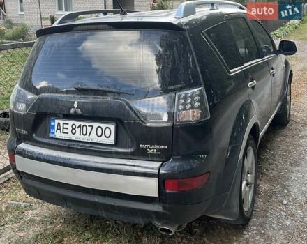 Чорний Міцубісі Аутлендер, об'ємом двигуна 2.36 л та пробігом 233 тис. км за 7500 $, фото 1 на Automoto.ua