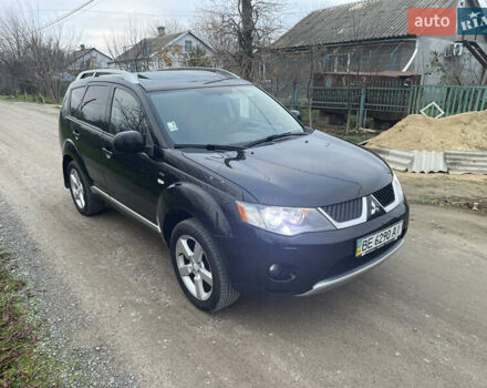 Черный Мицубиси Аутлендер, объемом двигателя 3 л и пробегом 265 тыс. км за 9200 $, фото 1 на Automoto.ua
