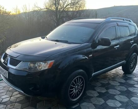 Черный Мицубиси Аутлендер, объемом двигателя 2 л и пробегом 288 тыс. км за 9200 $, фото 1 на Automoto.ua
