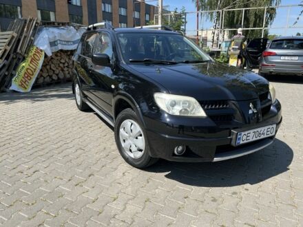 Міцубісі Аутлендер 2007 у Чернівцях на Automoto.ua Чорний Міцубісі Аутлендер, об'ємом двигуна 2 л та пробігом 238 тис. км за 6200 $, фото 1 на Automoto.ua