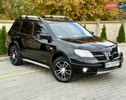 Міцубісі Аутлендер 2007 у Одесі на Automoto.ua Чорний Міцубісі Аутлендер, об'ємом двигуна 2.4 л та пробігом 201 тис. км за 7700 $, фото 1 на Automoto.ua