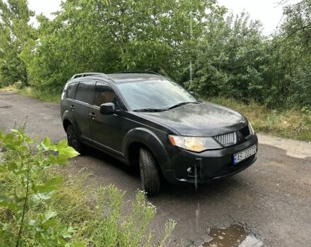 Чорний Міцубісі Аутлендер, об'ємом двигуна 2 л та пробігом 500 тис. км за 4200 $, фото 1 на Automoto.ua