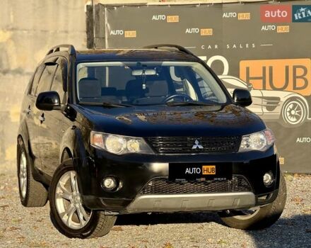 Черный Мицубиси Аутлендер, объемом двигателя 3 л и пробегом 198 тыс. км за 9500 $, фото 1 на Automoto.ua