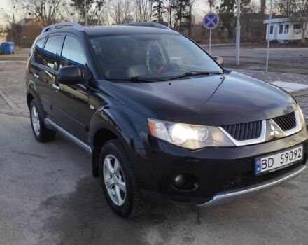 Черный Мицубиси Аутлендер, объемом двигателя 2 л и пробегом 290 тыс. км за 4900 $, фото 1 на Automoto.ua