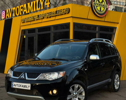 Черный Мицубиси Аутлендер, объемом двигателя 2 л и пробегом 186 тыс. км за 7200 $, фото 1 на Automoto.ua