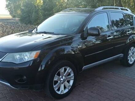 Черный Мицубиси Аутлендер, объемом двигателя 1.97 л и пробегом 244 тыс. км за 9000 $, фото 1 на Automoto.ua