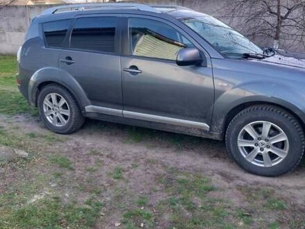 Черный Мицубиси Аутлендер, объемом двигателя 1.97 л и пробегом 350 тыс. км за 7888 $, фото 1 на Automoto.ua