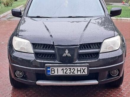 Мицубиси Аутлендер 2007 в Кременчуге на Automoto.ua Черный Мицубиси Аутлендер, объемом двигателя 2.4 л и пробегом 262 тыс. км за 7300 $, фото 1 на Automoto.ua