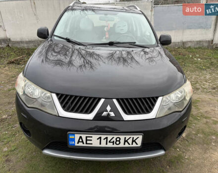 Черный Мицубиси Аутлендер, объемом двигателя 3 л и пробегом 300 тыс. км за 9500 $, фото 1 на Automoto.ua