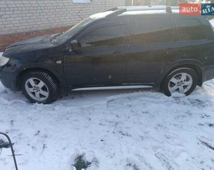 Чорний Міцубісі Аутлендер, об'ємом двигуна 2.4 л та пробігом 250 тис. км за 6700 $, фото 1 на Automoto.ua