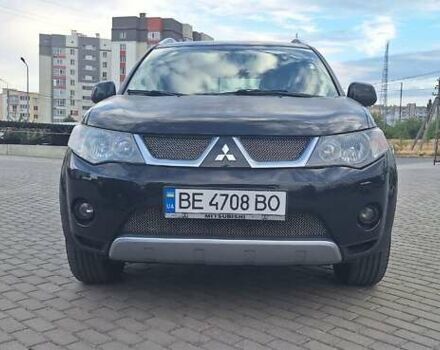 Черный Мицубиси Аутлендер, объемом двигателя 3 л и пробегом 150 тыс. км за 8000 $, фото 1 на Automoto.ua