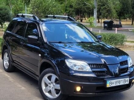 Міцубісі Аутлендер 2007 у Баштанке на Automoto.ua Чорний Міцубісі Аутлендер, об'ємом двигуна 2.4 л та пробігом 242 тис. км за 7100 $, фото 1 на Automoto.ua