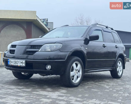Чорний Міцубісі Аутлендер, об'ємом двигуна 2.38 л та пробігом 202 тис. км за 5800 $, фото 1 на Automoto.ua