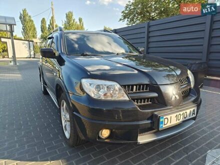 Мицубиси Аутлендер 2007 в Черкассах на Automoto.ua Черный Мицубиси Аутлендер, объемом двигателя 2 л и пробегом 191 тыс. км за 7500 $, фото 1 на Automoto.ua