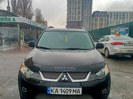 Черный Мицубиси Аутлендер, объемом двигателя 3 л и пробегом 290 тыс. км за 8300 $, фото 1 на Automoto.ua