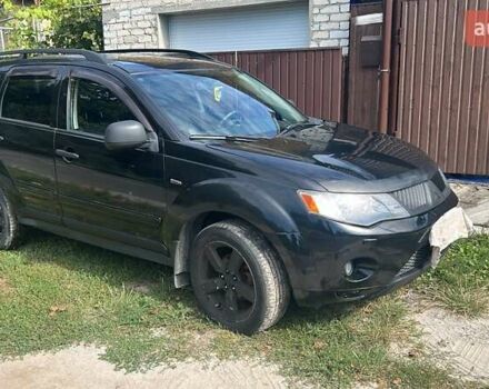 Черный Мицубиси Аутлендер, объемом двигателя 3 л и пробегом 257 тыс. км за 9200 $, фото 1 на Automoto.ua