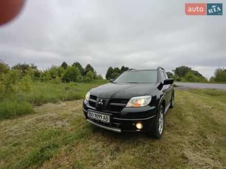Міцубісі Аутлендер 2007 у Тернополі на Automoto.ua Чорний Міцубісі Аутлендер, об'ємом двигуна 2 л та пробігом 169 тис. км за 7200 $, фото 1 на Automoto.ua
