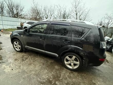 Черный Мицубиси Аутлендер, объемом двигателя 2.4 л и пробегом 215 тыс. км за 8300 $, фото 1 на Automoto.ua